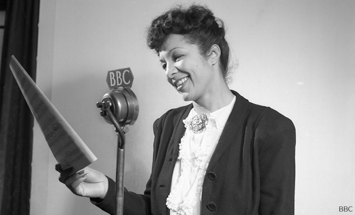 Evelyn Dove at the BBC microphone